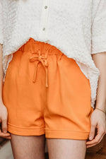 Tangy Orange Ruffle Shorts